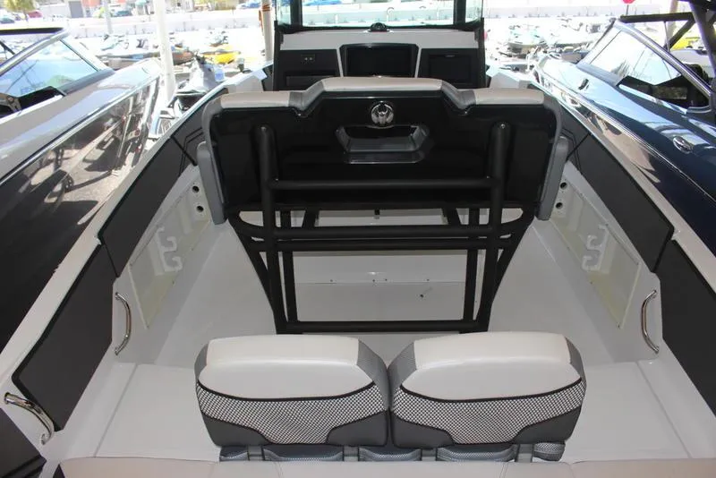 Slide: The Image of 2023 Scarab 255 ID boat interior with seating and storage compartments. - 3