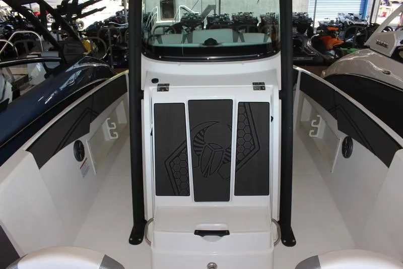 Slide: The Image of 2023 Scarab 255 ID boat interior with black and white design. - 5