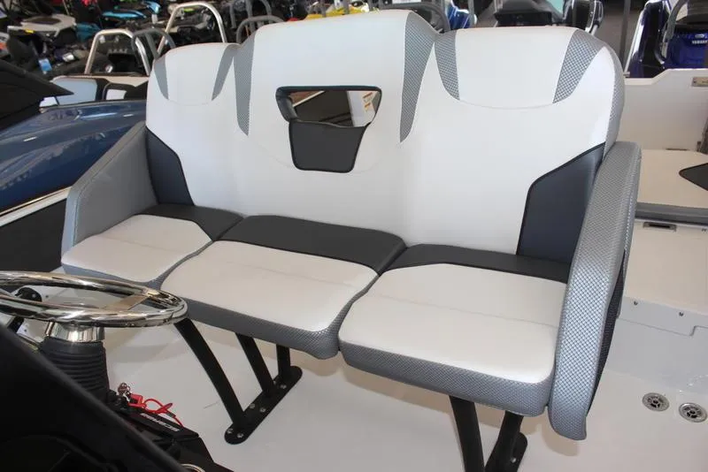 Slide: The Image of 2023 Scarab 255 ID boat interior seating with modern design and comfortable upholstery. - 6