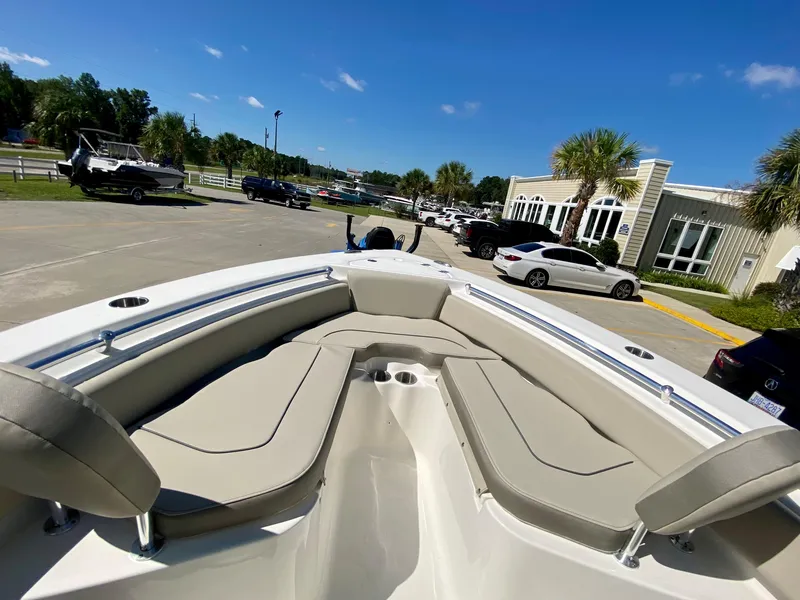 Slide: The Image of 2024 Key West 219 FS boat with spacious seating and modern design. - 19