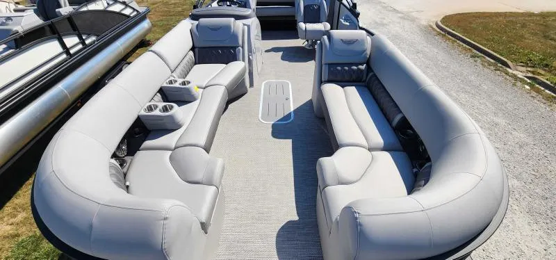 Slide: The Image of 2024 Bennington 26 LXSSB pontoon boat with spacious seating and modern design. - 4