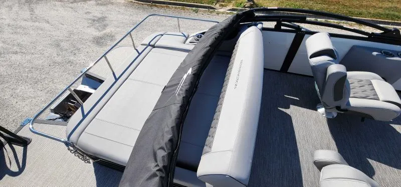 Slide: The Image of 2024 Bennington 26 LXSSB boat interior with seating and railing. - 5