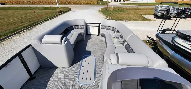 Slide: The Image of 2024 Bennington 26 LXSSB pontoon boat with spacious seating and modern design. - 6