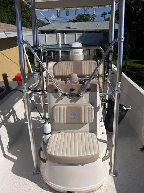 Slide: The Image of 2019 Carolina Skiff 258 DLV boat interior with seating and console. - 15