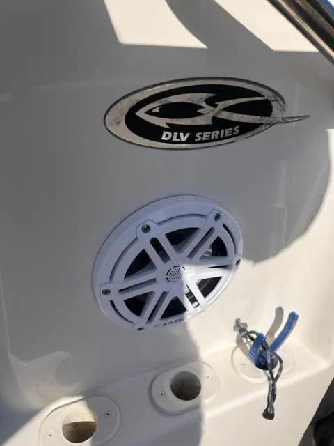 Slide: The Image of 2019 Carolina Skiff 258 DLV boat with speaker and DLV Series logo. - 18