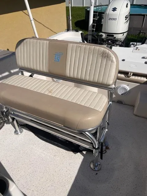Slide: The Image of 2019 Carolina Skiff 258 DLV boat seat with Suzuki 200 outboard motor in background. - 20