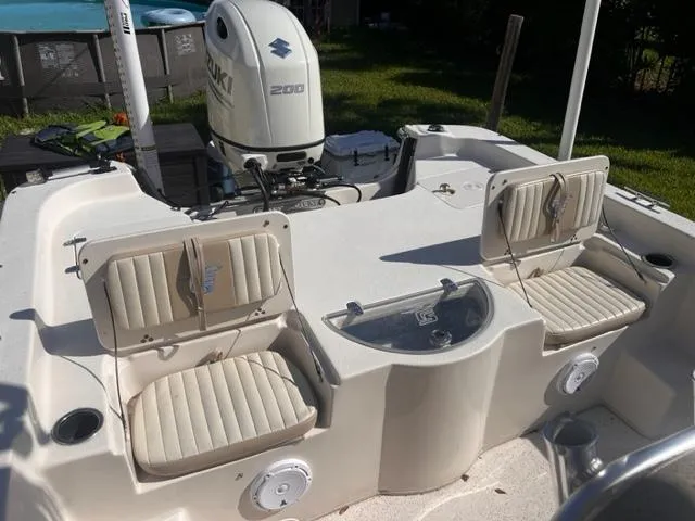 Slide: The Image of 2019 Carolina Skiff 258 DLV boat with Suzuki 200 outboard motor. - 22