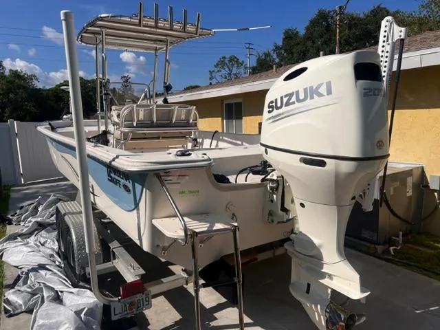 Slide: The Image of 2019 Carolina Skiff 258 DLV boat with Suzuki 210 outboard motor. - 8