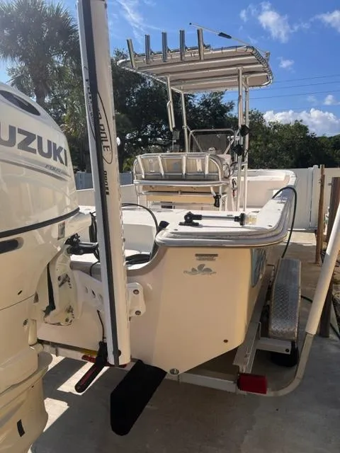 Slide: The Image of 2019 Carolina Skiff 258 DLV boat with Suzuki outboard motor. - 9