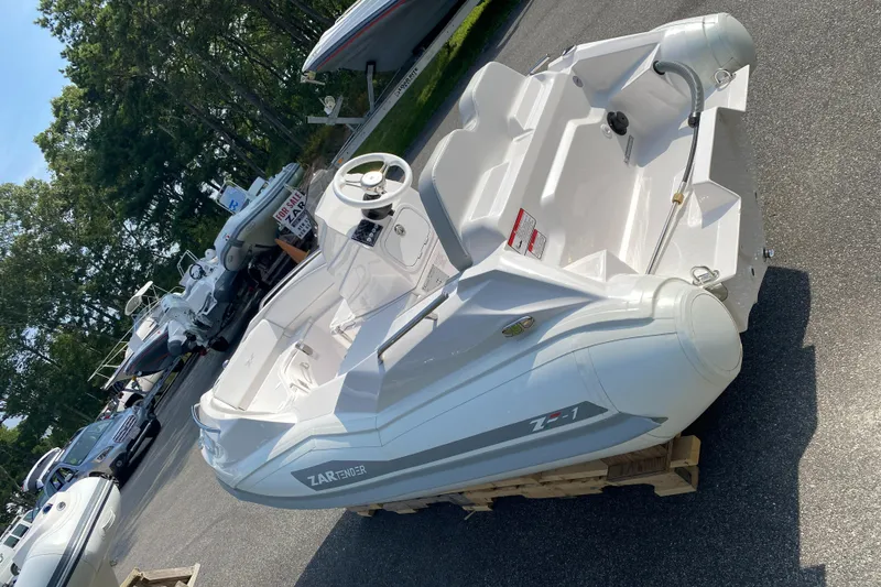 Slide: The Image of 2024 Zar Formenti TENDER ZF-1 boat on display outdoors. - 2