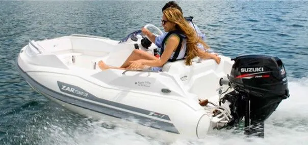 Slide: The Image of 2024 Zar Formenti TENDER ZF-1 boat with Suzuki outboard motor on water. - 3