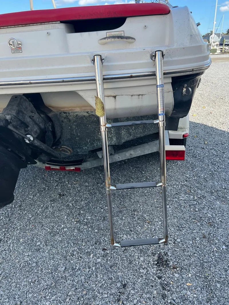 Slide: The Image of Rear view of 2006 Sea Ray 205 Sport boat with extended swim ladder. - 3