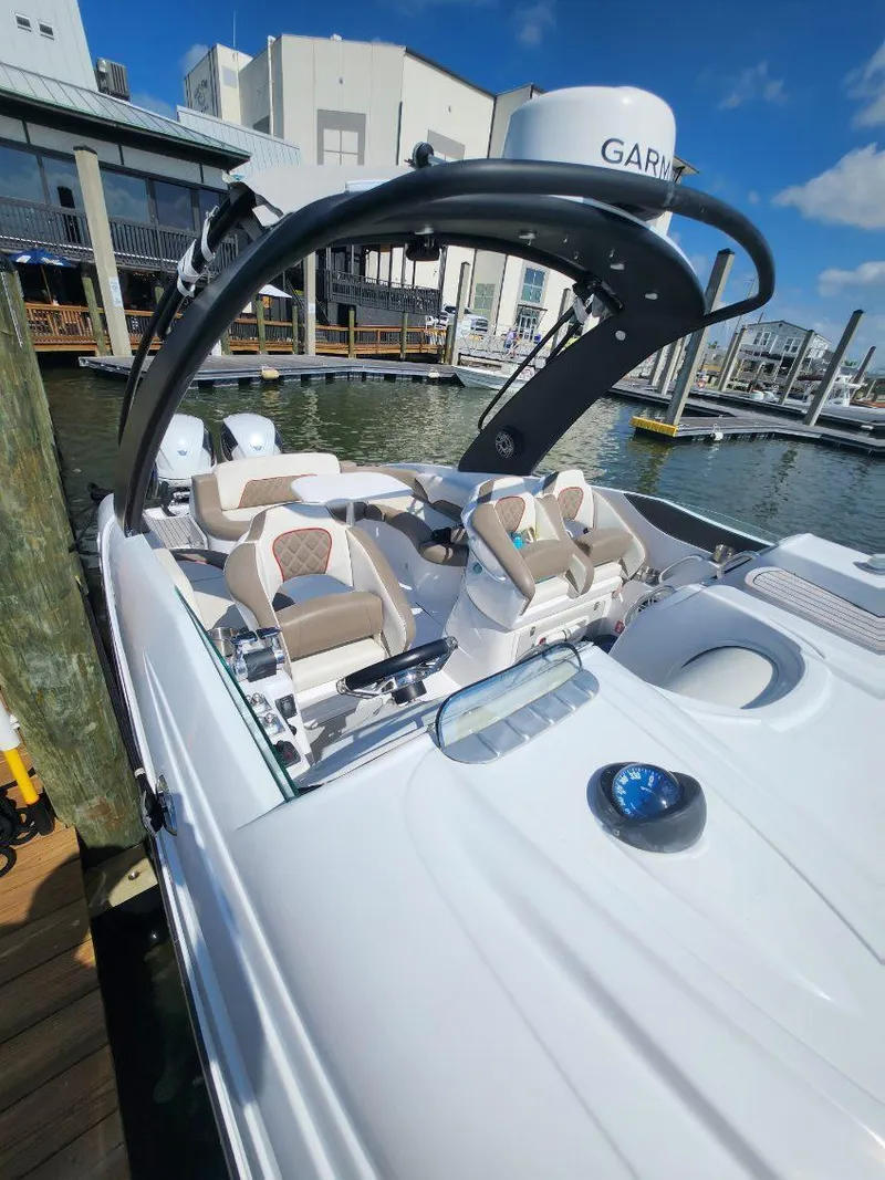 Slide: The Image of 2018 Pronautica 1260 Super Sport boat docked at marina with modern seating. - 13