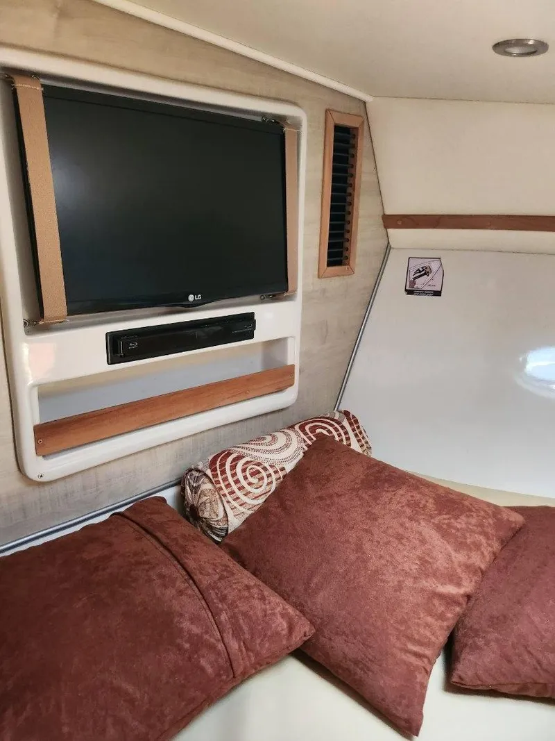 Slide: The Image of Interior cabin of 2018 Pronautica 1260 Super Sport with TV and cushions. - 14