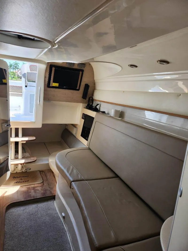 Slide: The Image of Interior of 2018 Pronautica 1260 Super Sport boat with seating and kitchenette. - 15