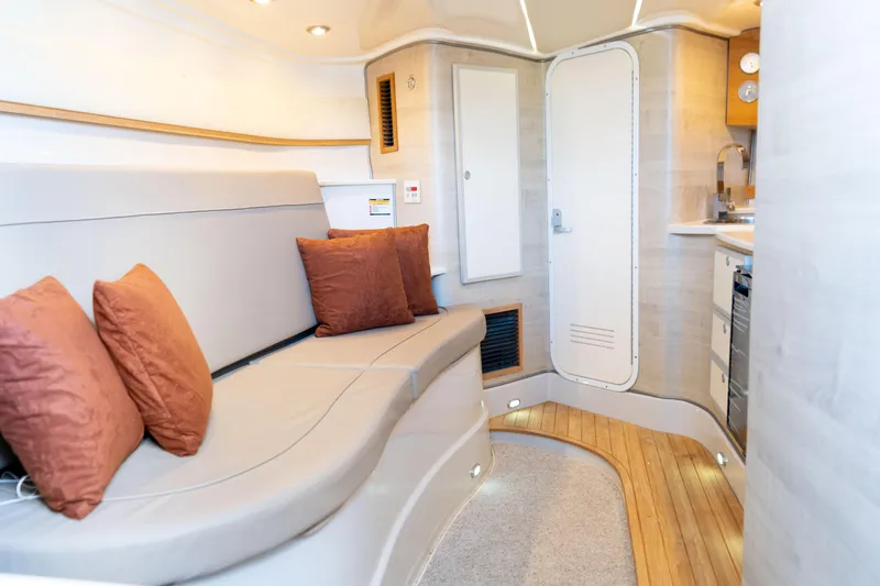 Slide: The Image of Interior of 2018 Pronautica 1260 Super Sport yacht with modern seating and kitchen area. - 16