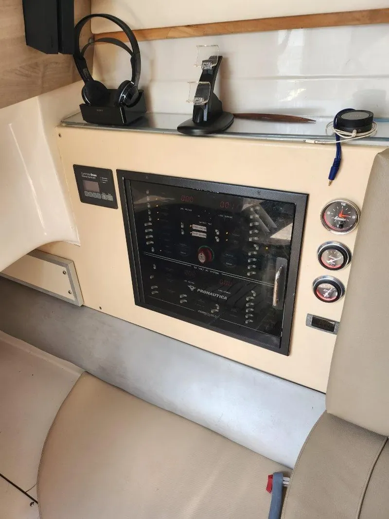 Slide: The Image of Control panel of a 2018 Pronautica 1260 Super Sport boat with gauges and electronics. - 3