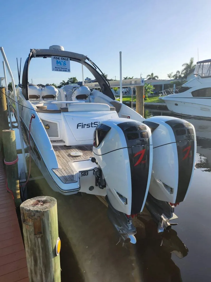 Slide: The Image of 2018 Pronautica 1260 Super Sport boat with twin engines docked in marina. - 4