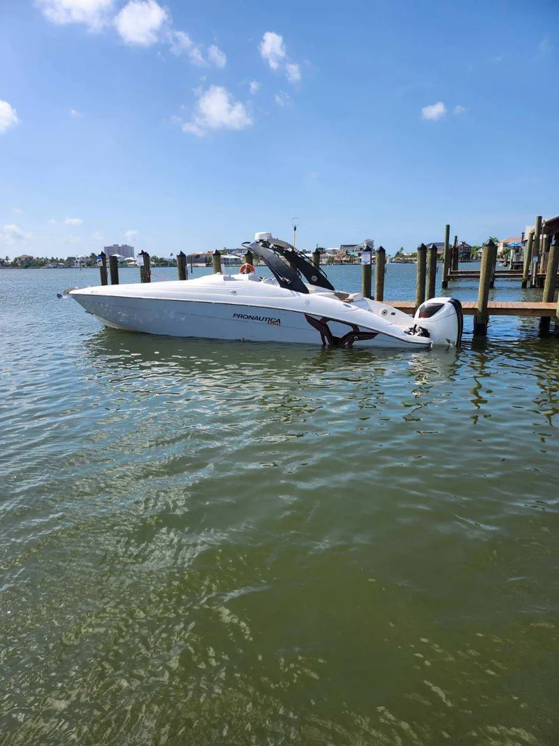 Slide: The Image of 2018 Pronautica 1260 Super Sport boat docked on a sunny day. - 5