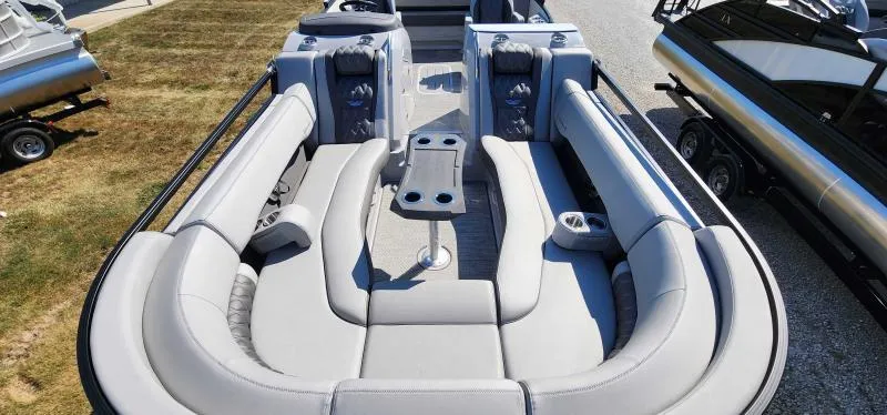 Slide: The Image of 2024 Bennington 25 RTSB pontoon boat with spacious seating and table. - 4