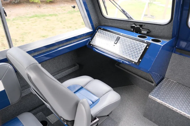 Slide: The Image of Interior of 2024 Thunder Jet 21 Chinook Pro boat with seating and storage. - 19