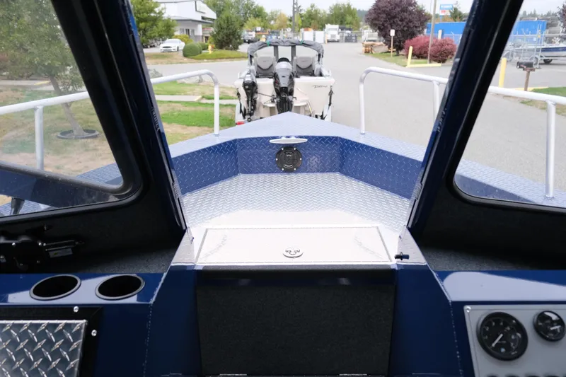 Slide: The Image of 2024 Thunder Jet 21 Chinook Pro boat interior view with dashboard and windshield. - 20
