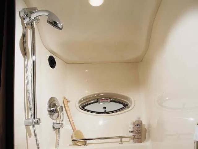 Slide: The Image of Luxurious shower area in 2007 Sea Ray 38 Sundancer yacht, featuring modern fixtures. - 23