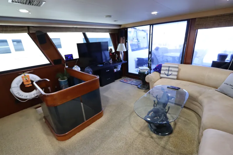 Slide: The Image of Luxurious interior of a 1991 Viking Motor Yacht with modern amenities and elegant decor. - 37