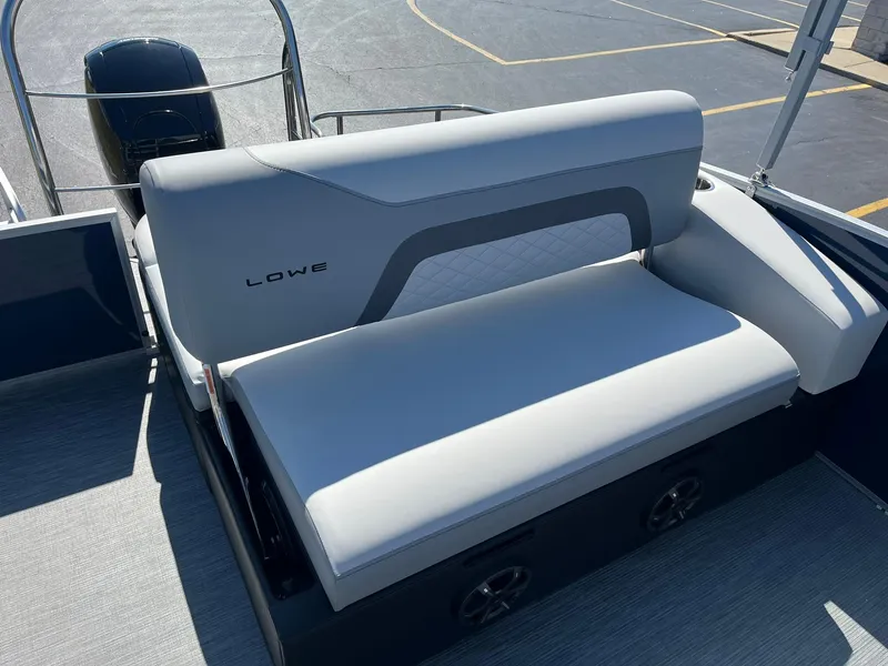 Slide: The Image of 2024 Lowe SS 210 DL boat with comfortable seating and modern design. - 13