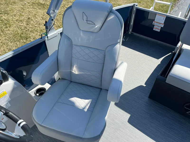 Slide: The Image of 2024 Lowe SS 210 DL boat captain's chair with armrests and diamond-stitched upholstery. - 21
