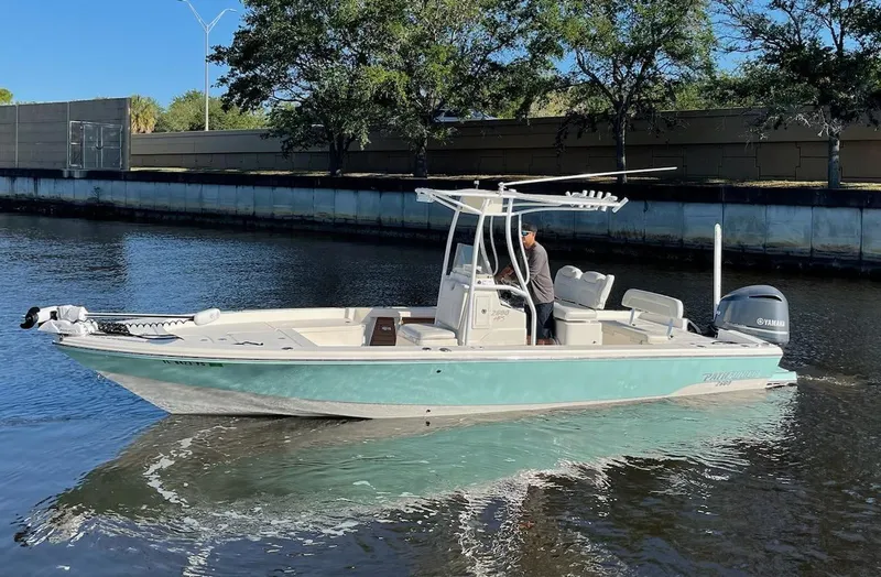 Slide: The Image of 2014 Pathfinder 2600 HPS boat cruising on a calm river. - 5