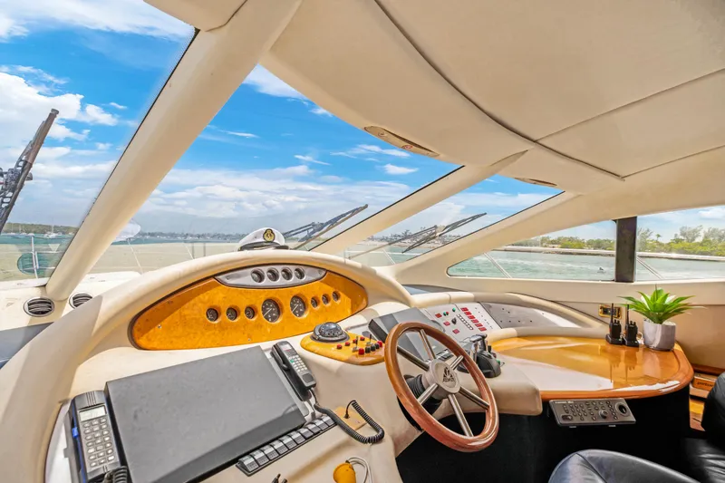 Slide: The Image of Luxurious helm of a 2004 Azimut 62 yacht with panoramic views. - 13
