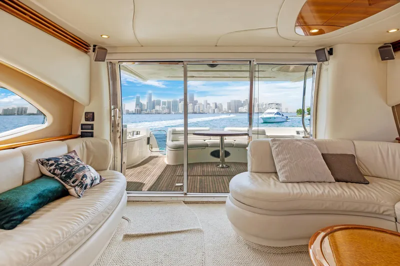 Slide: The Image of Luxurious interior of a 2004 Azimut 62 yacht with city skyline view. - 15