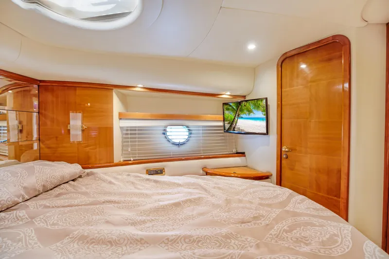 Slide: The Image of Luxurious bedroom interior of 2004 Azimut 62 yacht with TV and porthole. - 20