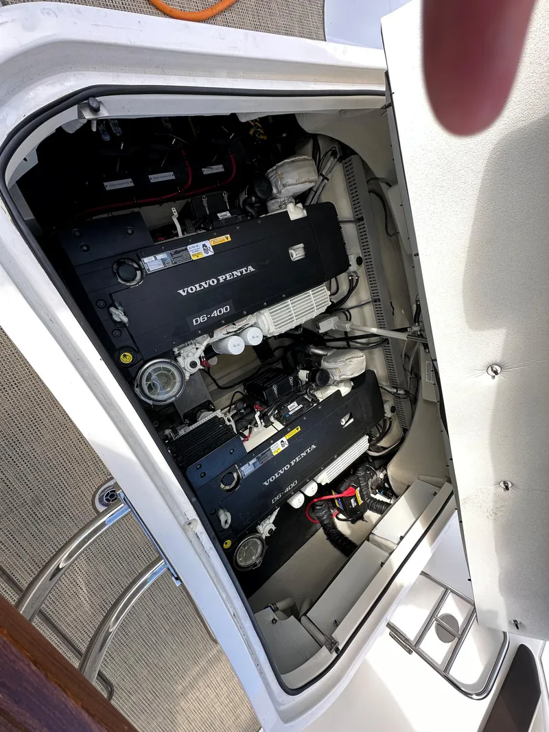 Slide: The Image of Engine compartment of a 2015 Cobalt A40 boat with Volvo Penta engines. - 30