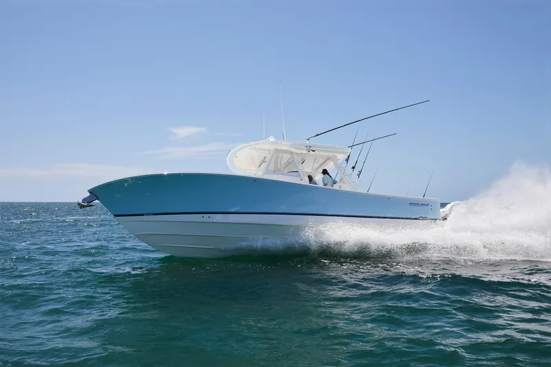 The Image of 2025 Regulator 37 boat cruising on open water. - 0