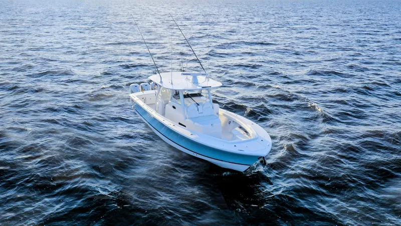 Slide: The Image of 2025 Regulator 37 boat on open water. - 15