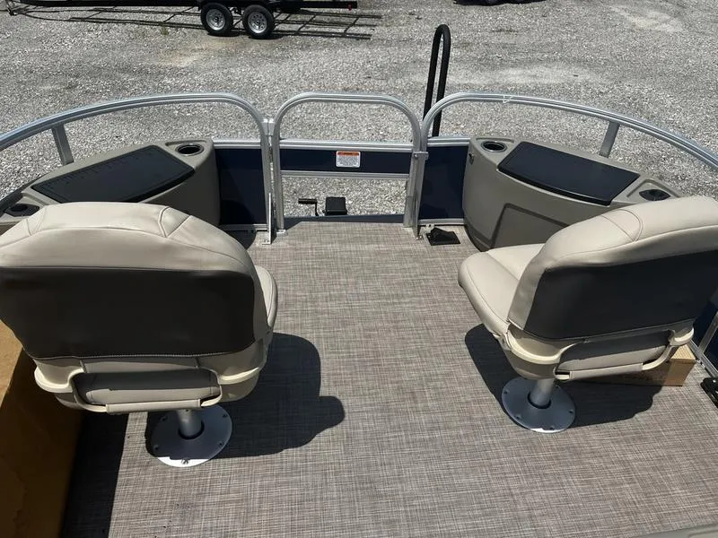 Slide: The Image of 2024 Sun Tracker Bass Buggy 18 DLX pontoon boat with two swivel seats. - 3