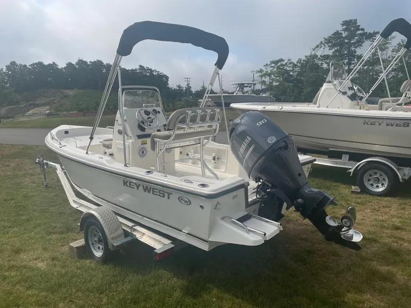 Slide: The Image of 2024 Key West 1720 Center Console boat with Yamaha 90 engine on trailer. - 4
