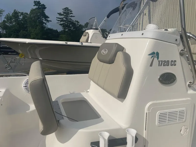 Slide: The Image of 2024 Key West 1720 Center Console boat with seating and storage compartments. - 6