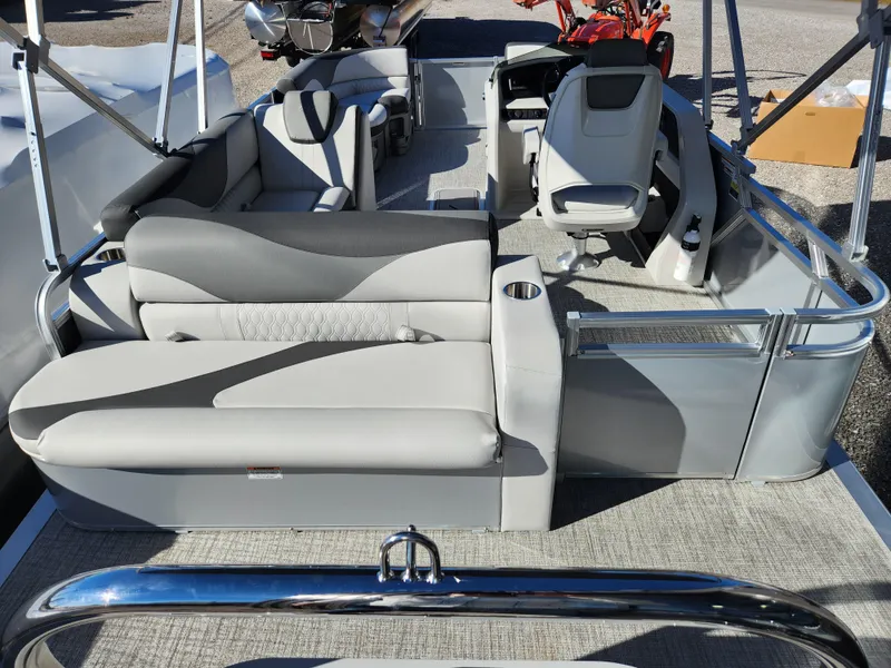 Slide: The Image of 2024 Avalon Platinum LSZ 1985 CRB pontoon boat interior with modern seating and helm. - 6