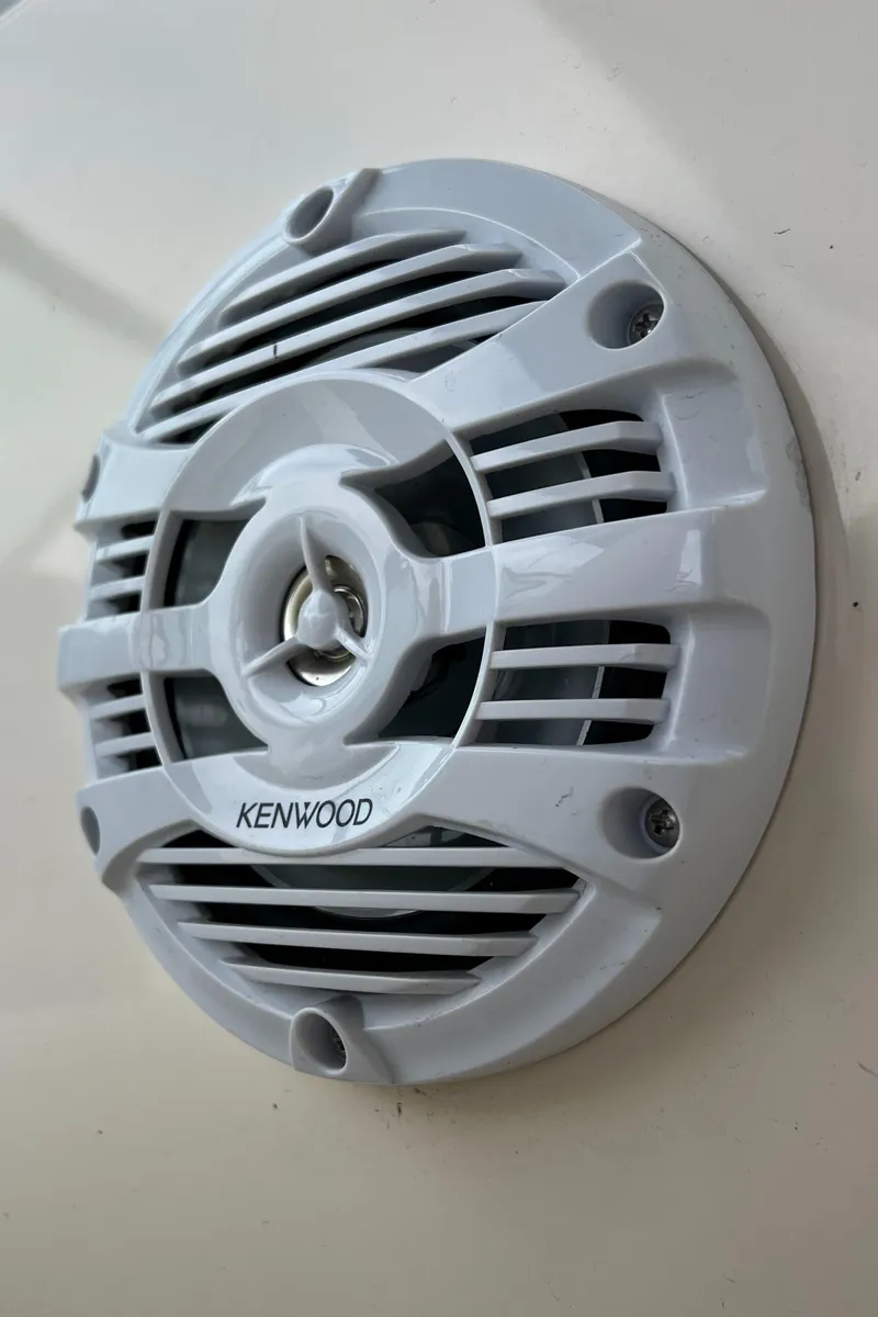 Slide: The Image of Kenwood speaker on 2002 Rinker 212 Captiva Bowrider boat. - 15