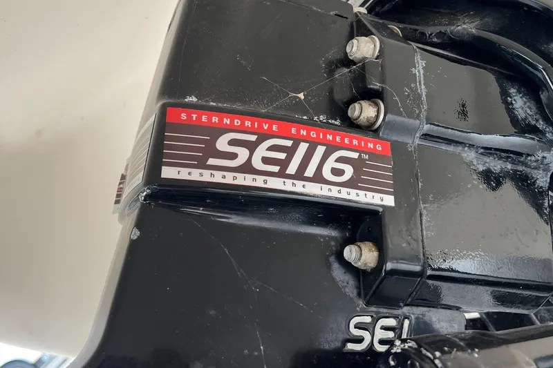 Slide: The Image of Close-up of SE116 sterndrive on 2002 Rinker 212 Captiva Bowrider. - 17