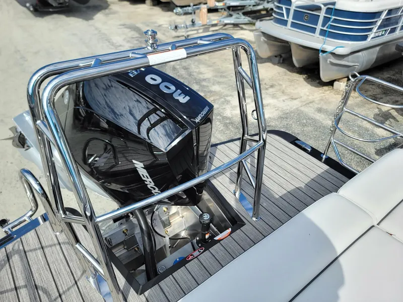 Slide: The Image of 2024 Harris Sunliner 230 Sport with Mercury 300 outboard engine. - 21