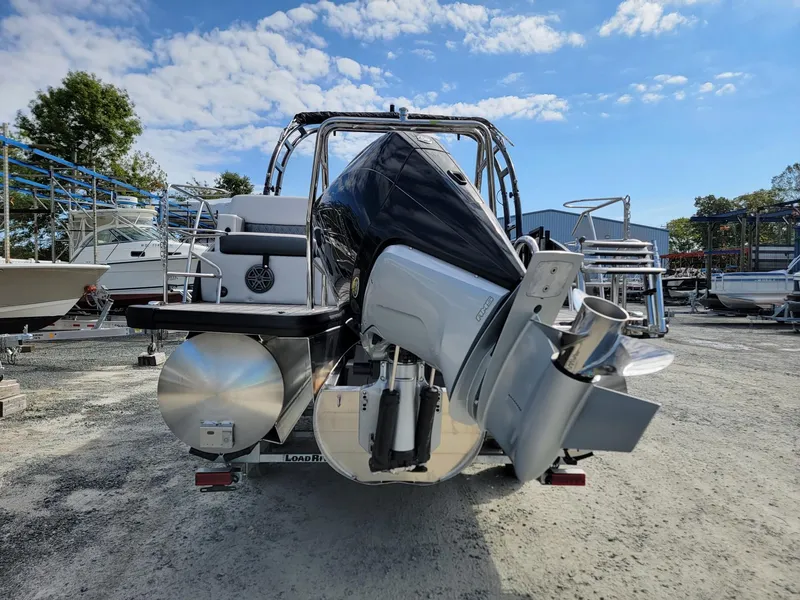 Slide: The Image of 2024 Harris Sunliner 230 Sport pontoon boat with outboard motor, rear view. - 5