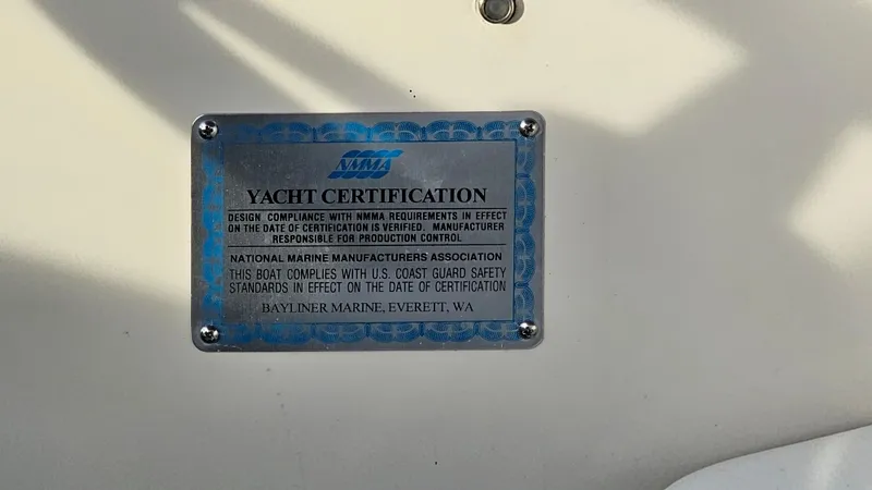 Slide: The Image of 1999 Maxum 3000 SCR yacht certification plaque. - 30