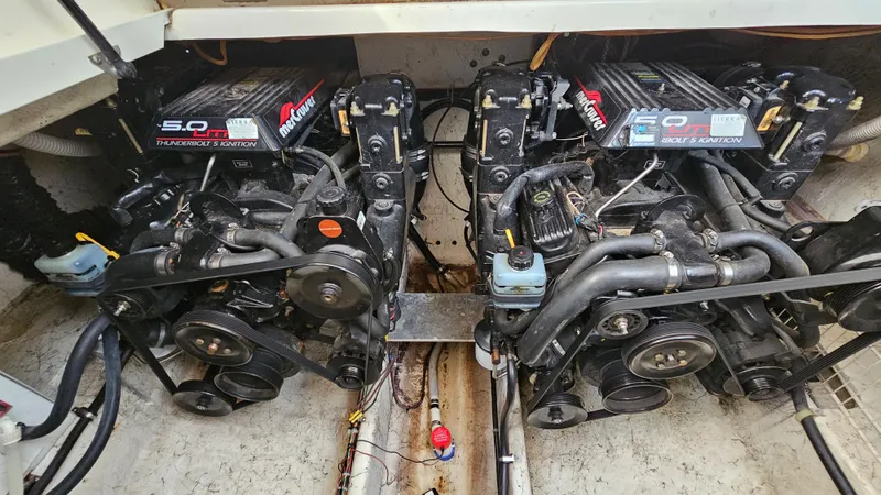 Slide: The Image of Twin MerCruiser engines in a 1999 Maxum 3000 SCR boat. - 31