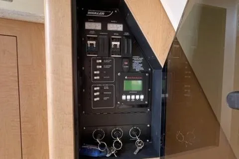 Slide: The Image of Control panel of a 2012 Boston Whaler 370 Outrage boat with key switches. - 21