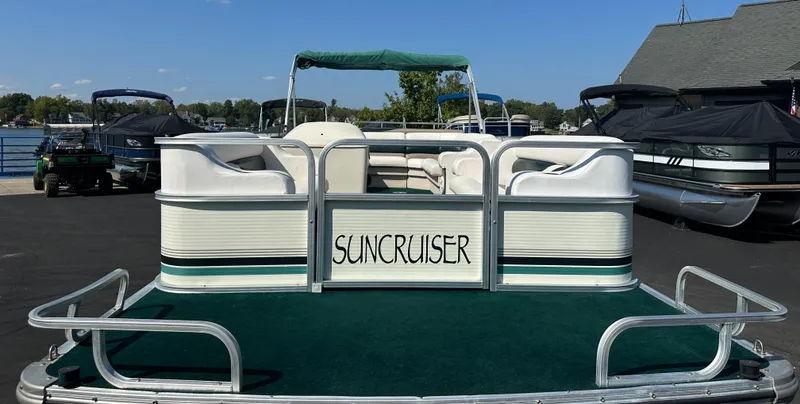 Slide: The Image of 1998 Suncruiser 240 Trinidad pontoon boat docked at marina. - 1