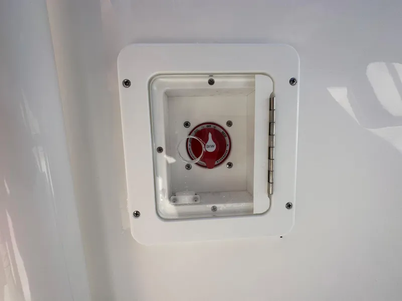 Slide: The Image of Battery switch compartment on a 2024 Tidewater 210 CC Adventure boat. - 24